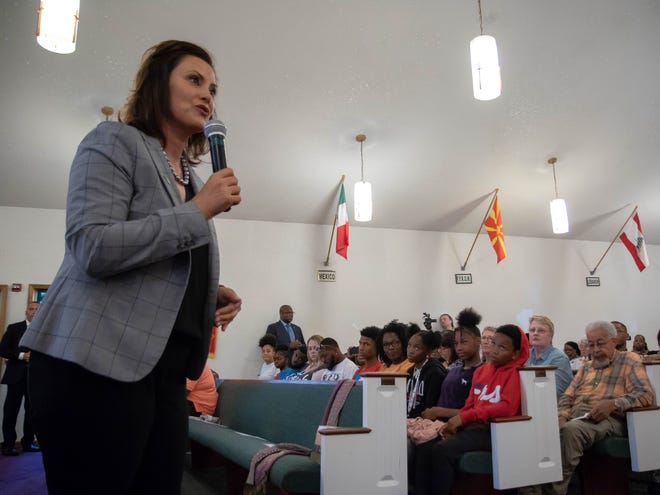 Gov. Gretchen Whitmer addresses residents of Benton Harbor at a local church during a special community meeting on Wednesday over the future of the city's high school.