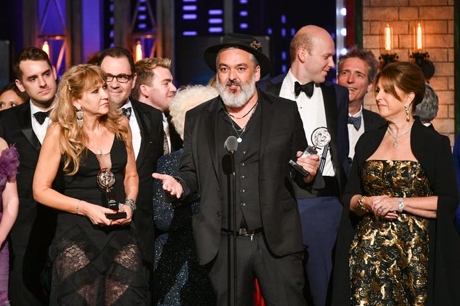 Jez Butterworth, and the company of "The Ferryman," accept the award for best play at the 73rd annual Tony Awards at Radio City Music Hall.