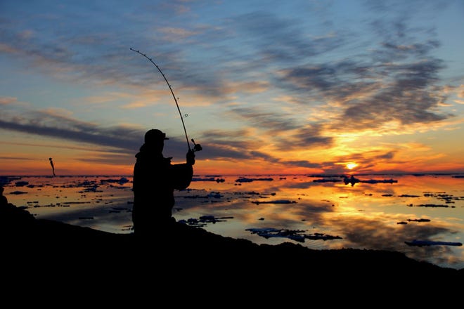 People and Places winner: “ Sunset Fishing, ” by Tyler Chandler of Clarkston. In mid-April, Michigan Tech student Chandler and his roommate Matt Krause “ decided that enough ice had melted from Lake Superior that we could get some casts in and hopefully catch some fish. ” The fish weren ’ t biting that day, but “ I decided that it might be cool to take a silhouette picture of Matt with the sunset in the back.