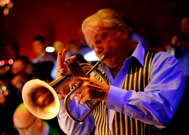 "High Note," by Gary Molnar of Leonard. Band leader Gary Greenfelder performs a solo at Studio 54 in Sterling Heights. "I thought the sound of hearing big bands perform live had evaporated by the end of the 1950s," Molnar said. "A few years ago I discovered this local 17-piece big band."