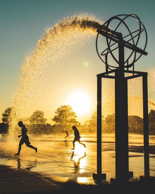 "Fountain of Youth," by Peter Brown of Benton Harbor. Brown stopped by the Whirlpool Compass Fountain in St. Joseph and decided to stick around until sunset. "I saw the kids playing and figured it would be an interesting shot with them running through the water," he said. "I was happy to stay dry!"
