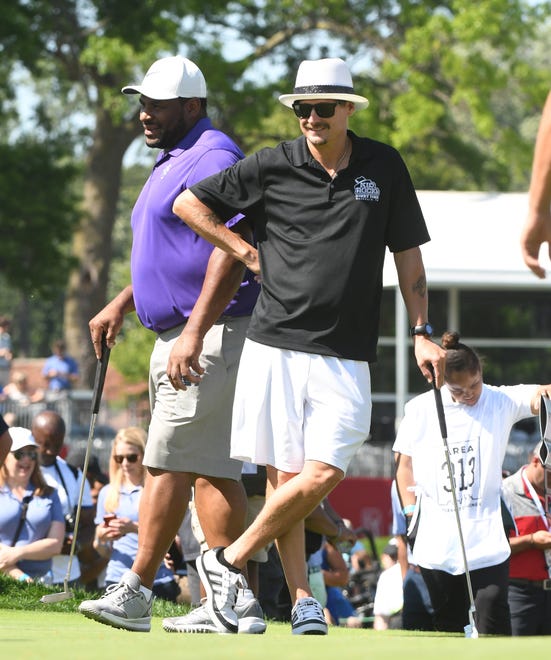 Jerome Bettis and Kid Rock on the 15th green.