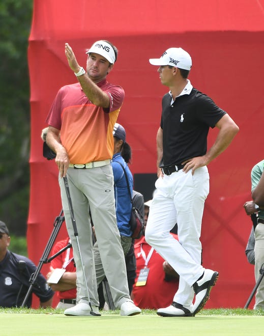 Bubba Watson, left, and Billy Horschel chat on the 7th green.