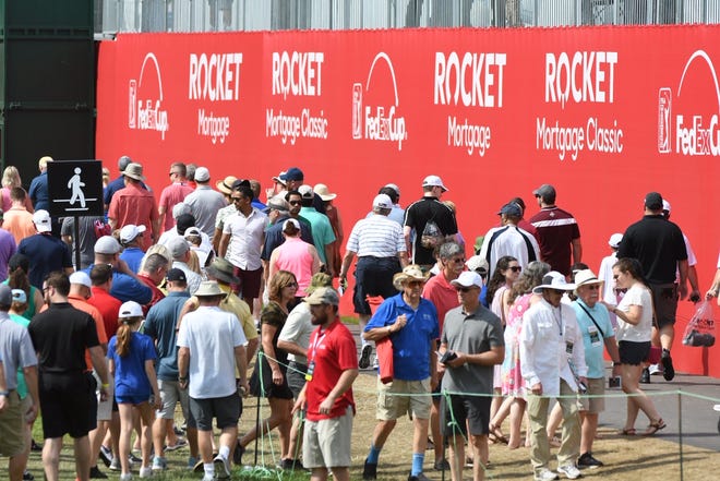 Fans begin enter the Detroit Golf Club for the third round of the Rocket Mortgage Classic on Saturday.