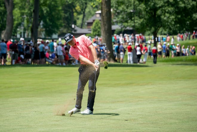 Jason Kokrak hits onto the eighth fairway from the first fairway during the Rocket Mortgage Classic.
