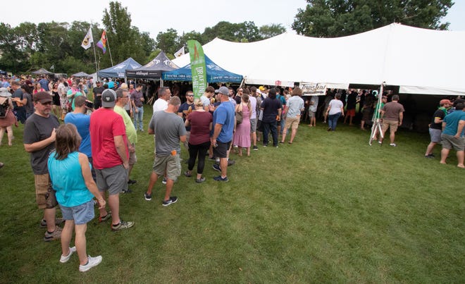 Summer Beer Festival attendees lined up all weekend to sample the offerings from Transient Artisan Ales, of Bridgman.