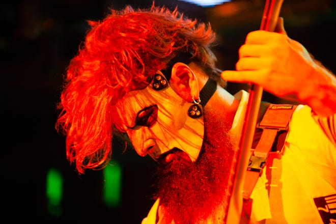 Slipknot guitarist Jim Root performs with the horror metal band as headliners on the Knotfest Roadshow tour stop at DTE Energy Music Theatre in Clarkston on Monday, August 12, 2019.