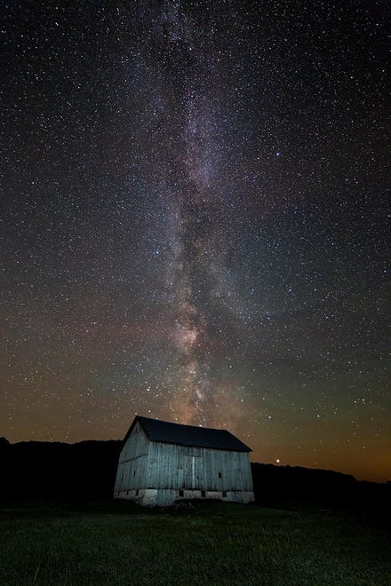 " The Old Barn & Milky Way, " by Dale Niesen of South Rockwood. Niesen took this starry shot in the early morning hours at Port Oneida in Sleeping Bear Sand Dunes National Lakeshore. " There was a lot of airglow that night, but no auroras.
