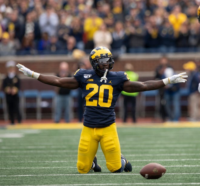 With Michigan defensive back Brad Hawkins reacts after breaking up a pass intended for  Iowa tight end Nate Wieting (39) during the Hawkeyes' final drive late in the fourth quarter.