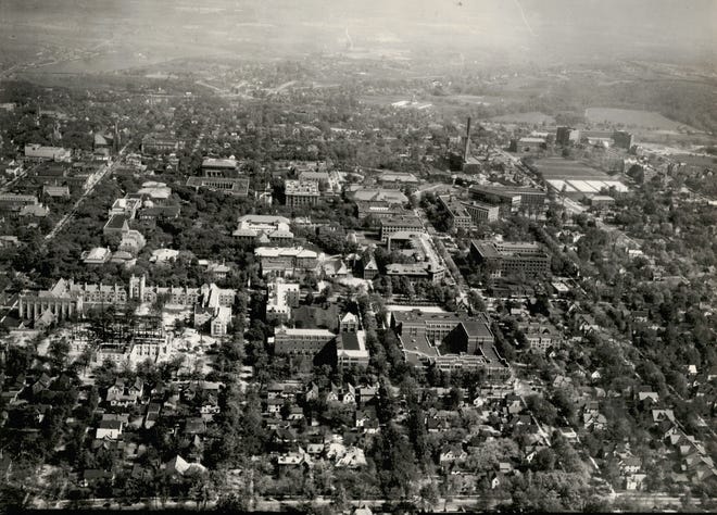 Parts of the University of Michigan Law School Quadrangle, left, were still under construction on the Ann Arbor campus on Nov. 9, 1929.