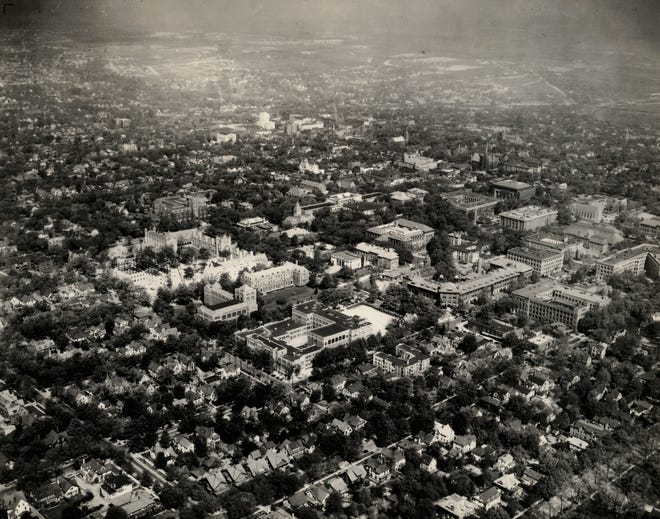 The University of Michigan campus in Ann Arbor, May 10, 1930. The large C-shaped building at center right is the West Engineering building, which opened in 1904.