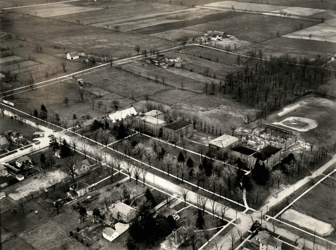 Adrian College, Adrian, Michigan, May 1, 1932. Established in 1859, the private liberal arts college has always had ties to the Methodist Church. Downs Hall (at center with dark roof), built in 1860, is the oldest and only building remaining from Adrian ' s original campus.