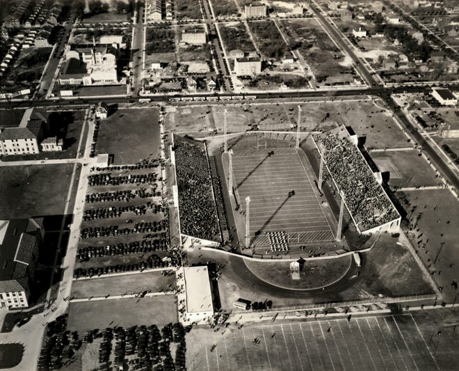 The Detroit Titans face the Iowa Hawkeyes in a Nov. 1, 1930 football game at University of Detroit Stadium. Iowa won, 7-3.  The university consolidated with Mercy College of Detroit in 1990 to form the University of Detroit Mercy.