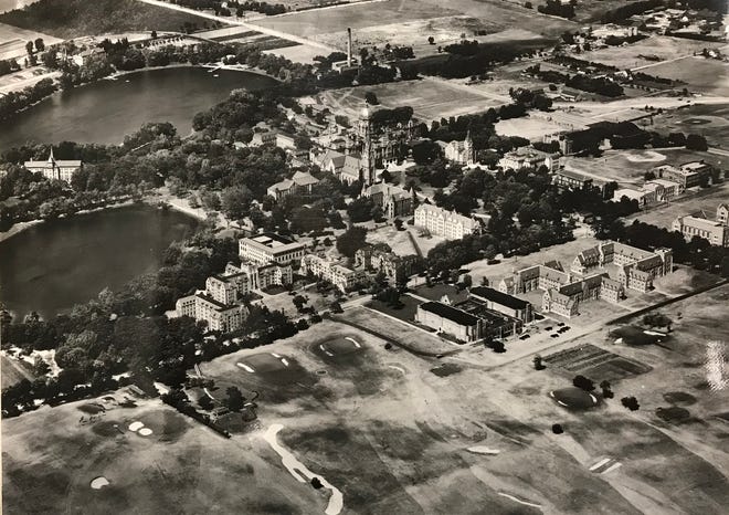 The University of Notre Dame was founded in 1844 by brothers of the Holy Cross congregation of the Catholic Church.  It was an all-male college until 1972. The university grew beside the banks of St. Mary's Lake, center left, and St. Joseph's Lake, top left.