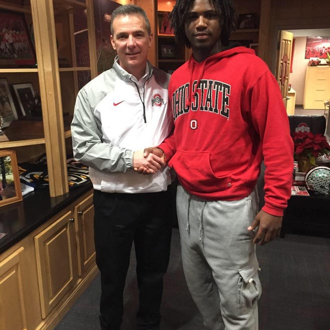 FEB. 3, 2016: On National Signing Day, Auston Robertson announces he is reopening his recruitment amid a series of troubling reports out of Indiana. 

In this photo, posted to Robertson's Facebook page on Feb. 1, 2015 shows him meeting with former Ohio State coach Urban Meyer.