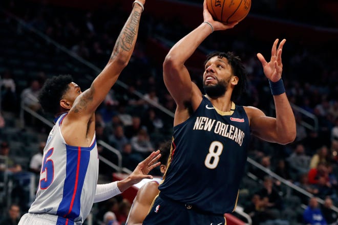 New Orleans Pelicans center Jahlil Okafor (8) shoots over Detroit Pistons forward Christian Wood during the second half.
