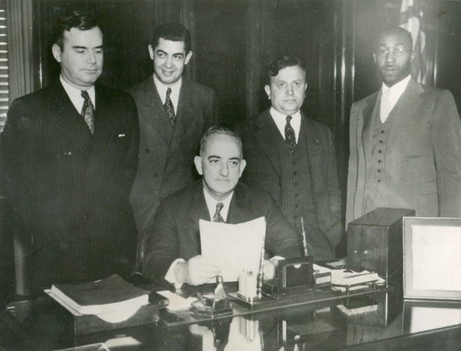 Duncan C. McCrea, seated, was one of the assistant prosecutors assigned to the Rose and Bill Veres trial. He soon took over the majority of the prosecution in the case and was quite the showman. McCrea was said to be taking bribes from the time he was elected Wayne County prosecutor in 1935. Like many others at city hall, he soon would come under investigation.