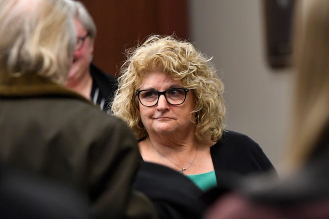 Former MSU Gymnastics coach Kathie Klages talks to supporters and family in Ingham County Circuit Court, February 11, 2020. Klages is charged with lying to investigators and denies being told by young gymnasts about sexual abuse by Larry Nassar.