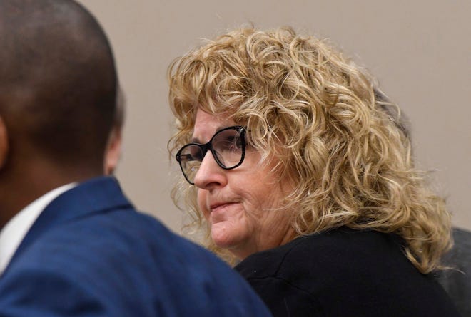 Kathie Klages, listens to testimony in the opening day in her trial in Ingham County Circuit Court in Lansing, February 11, 2020. Klages, a former Michigan State University gymnastics coach, is accused of lying to police about what she knew about the crimes of sex abuser Larry Nassar.