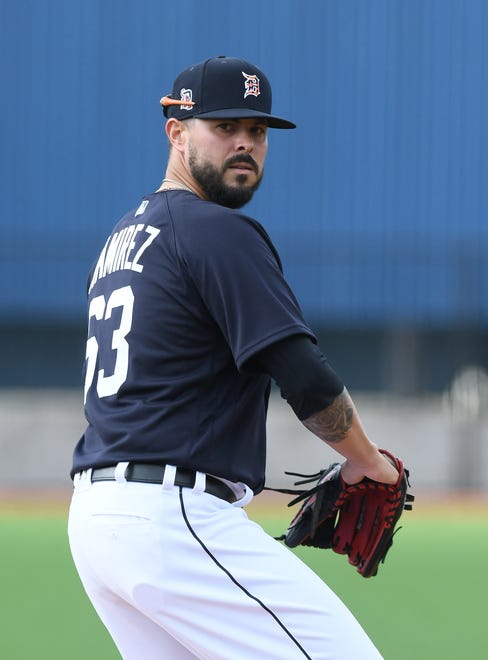 Tigers pitcher Nick Ramirez looks towards home plate during pitchers fielding practice.