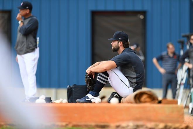 Tigers pitcher Daniel Norris sits in the bullpen before sessions start.