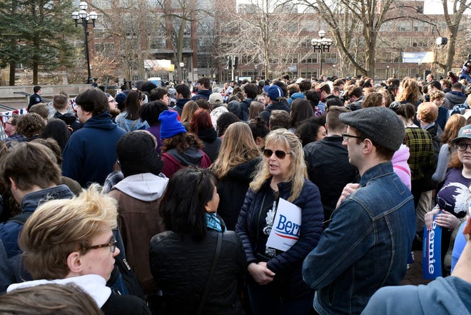 Supporters of U.S. Senator and presidential candidate Bernie Sanders begin to fill the Diag on the campus of The University of Michigan, Sunday, March 8, 2020 in Ann Arbor, Mich.