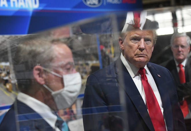 President Donald J. Trump and Executive Chairman of Ford Motor Company Bill Ford Jr. during a tour of the Ford Motor Company Rawsonville Components Plant.