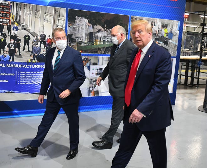 Executive Chairman of Ford Motor Company Bill Ford Jr., Ford CEO Jim Hackett and President Donald J. Trump during a tour of the Ford Motor Company Rawsonville Components Plant where PPE is being produced in the fight against COVID-19 pandemic.