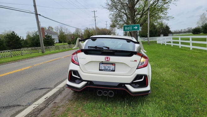 Like Cerberus, the three-headed hound from Hell, the 2020 Honda Civic Type R is recognizable by its three exhaust pipes.