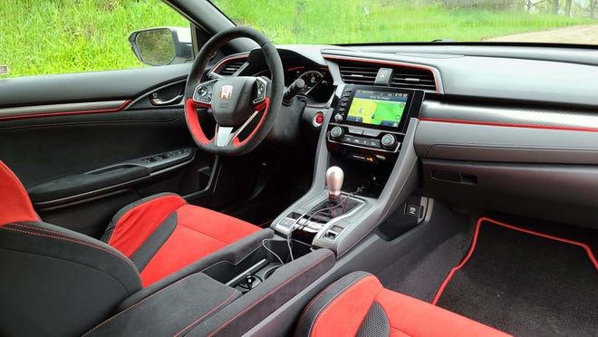 For about $38,000, the 2020 Honda Civic Type R features a loaded interior of bolstered, red, carbon seats, Level 2 autonomous driving/adaptive cruise control, Alcantara steering wheel, dual-zone climate control, and more. Only blind-spot assist and heated seats are conspicuously missing.