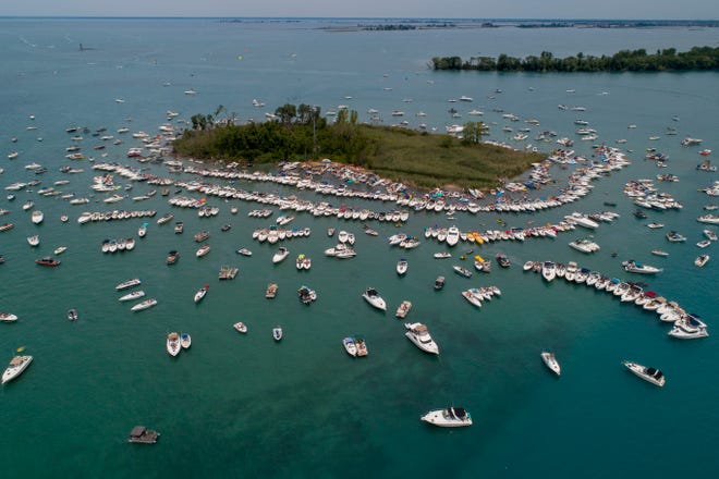 Boaters raft off during the annual Jobbie Nooner at Gull Island on Lake St. Clair, Friday, June 26, 2020.