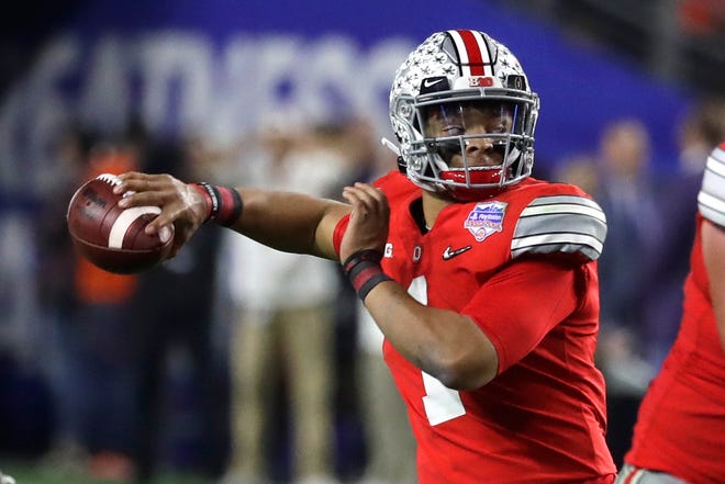 Justin Fields, QB, Ohio State: Fields, a Georgia transfer, starred in his first season with the Buckeyes, completing 67.2% of his passes for 3,273 yards, rushing for 484 more and recording 51 total touchdowns. He became the first quarterback in Big Ten history with 40 passing touchdowns and 10 rushing scores in the same season, and his 41-3 touchdown-to-interception ratio was tops in the country. After finishing third in the 2019 Heisman Trophy voting, Fields is among the favorites to win it this year.