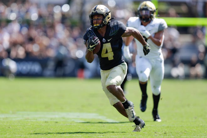 Rondale Moore, WR, Purdue: There aren't many players who are as electric and versatile as Moore. In 2018, he led all of college football with 37 broken tackles on 114 catches, per Pro Football Focus, and set a program record with 2,215 all-purpose yards as a dynamic pass-catcher, ball carrier and kick returner. Despite being undersized (5-foot-9, 180 pounds) and coming off an injury-ruined season, he's still one of the top offensive threats in the country.