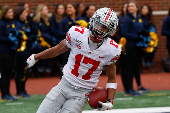 Chris Olave, WR, Ohio State: Defenders had trouble keeping up with the speedy Olave, who led the Buckeyes with 849 receiving yards and 12 touchdown receptions a year ago. According to Pro Football Focus, he generated at least two steps of separation on 57% of his targets thrown 10-plus yards down the field, which was the highest rate among all receivers. With fellow pass-catchers K.J. Hill, Binjimen Victor and Austin Mack all gone, Olave is primed to put up even bigger numbers.