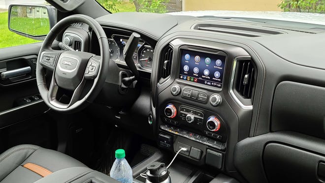 The interior of the 2020 GMC Sierra AT4 is comfortable and ergonomically useful — but it lags competitors like the Ram 1500.