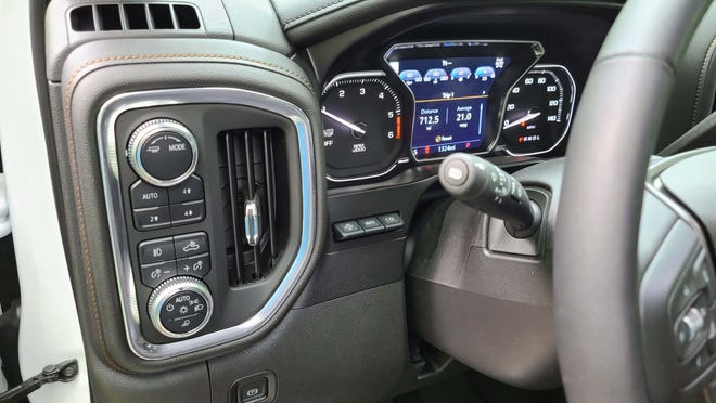 The quarter dash panel in the 2020 GMC Sierra AT4 puts useful features at the driver's fingertips.