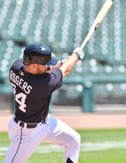 The Tigers' Jake Rogers hits a solo home run during an intrasquad game.