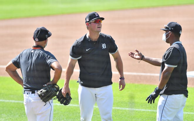 From left, Alan Trammell, Tigers top draft pick Spencer Torkelson and third-base coach Ramon Santiago talk after Torkelson worked with them on infield drills before an intrasquad game Thursday, July 9, 2020, at Comerica Park.