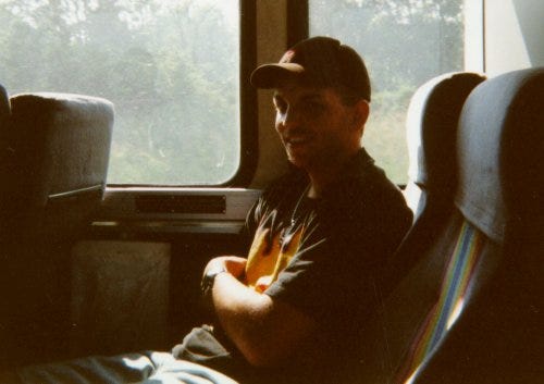 Scott Donihoo rides a bus on his way from Dallas to Detroit to attend the first Gathering of the Juggalos festival.