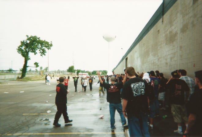 Fans line up outside the first Gathering of the Juggalos festival at the Novi Expo Center in July 2000.