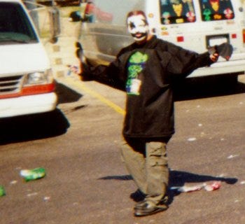A fan is seen in the parking lot at the first Gathering of the Juggalos festival at the Novi Expo Center in July 2000.