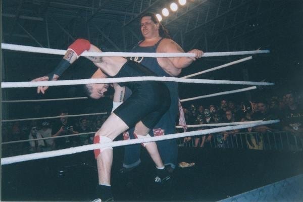 Tom Dub and Haystack wrestle at the Gathering of the Juggalos festival.