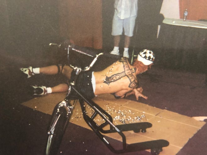 Shaggy 2 Dope rolls in a bed of thumbtacks at the first Gathering of the Juggalos.