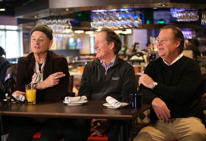 Actor Bill Murray speaks along with Mac Haskall and brother Joel Murray at Caddyshack restaurant in Rosemont in 2018.