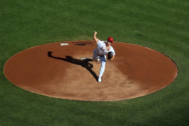 Cincinnati Reds' Sonny Gray (54) throws in the first inning of a baseball game against the Detroit Tigers at Great American Ballpark in Cincinnati, Friday, July 24, 2020.