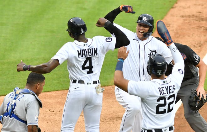 Tigers' JaCoby Jones reacts after his three-run home run with teammates Cameron Maybin (4) and Victor Reyes (25) in the second inning.
