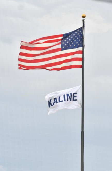 A flag flies for Al Kaline during pregame ceremony.