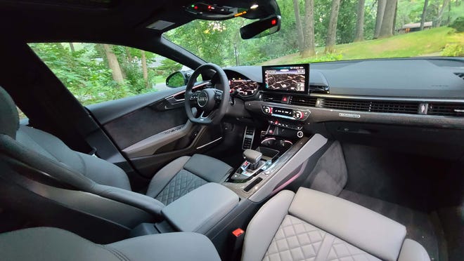 The interior of the 2020 Audi S5 Sportback is a pleasant place to be with quilted leather seats, digital screens and a T-shifter.