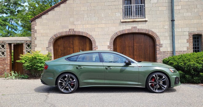 The distinct side profile of the 2020 Audi S5 Sportback shows off its fast back, 20-inch wheels and shapely rocker panels.