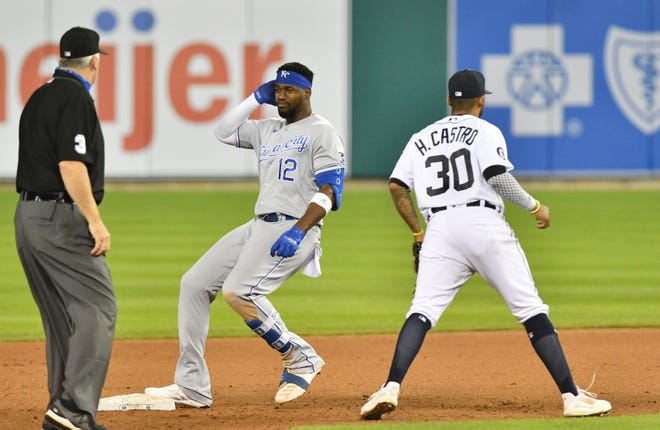 Royals' Jorge Soler doubles and arrives at second base in the ninth inning next to Tigers shortstop Harold Castro.  Detroit Tigers vs Kansas City Royals at Comerica Park in Detroit on July 30, 2020.  Royals win, 5-3.